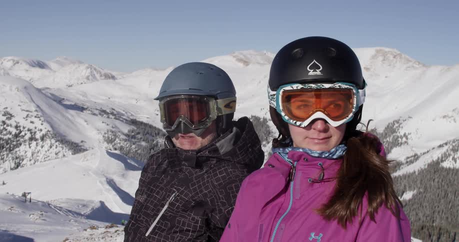 Two skiers enjoying the view