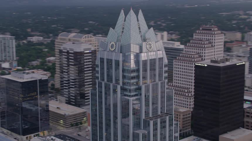 Towers and skyscrapers stand tall above the city downtown