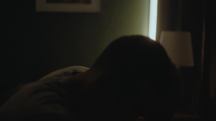 A man waking up in the morning