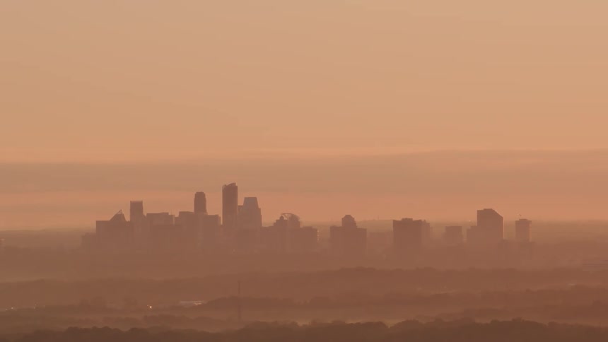 A city skyline in a haze of air pollution and smog