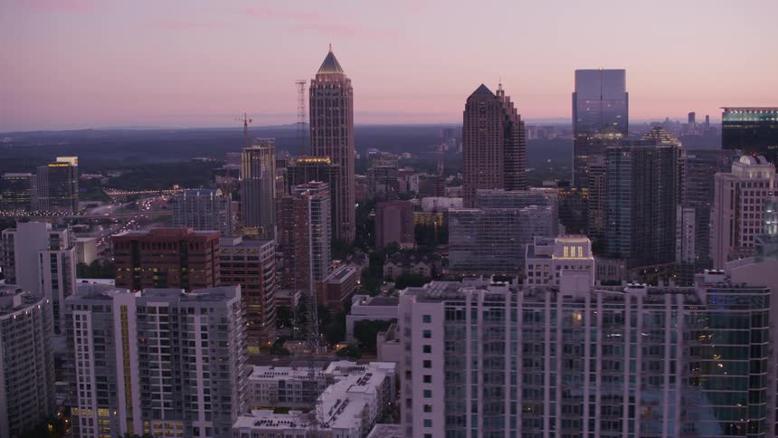Skyscrapers in a metropolis at sunset