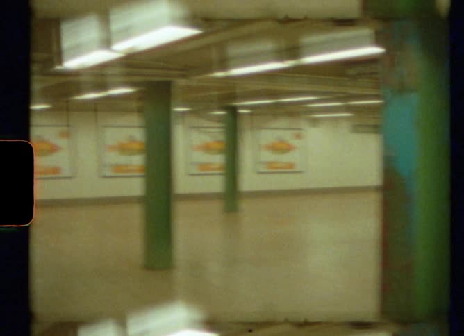 An underground subway terminal is empty