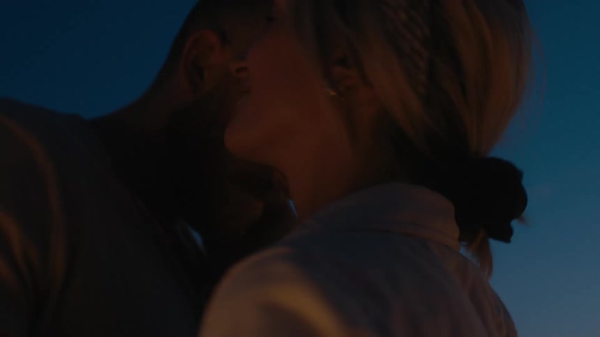 Closeup of happy romantic couple dancing outdoors at night