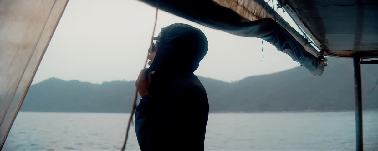 A woman is a passenger on a boat