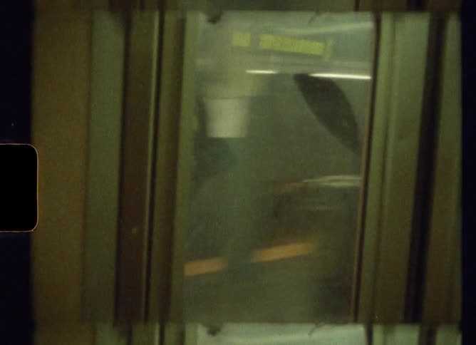 Subway train leaving the station caught on vintage film