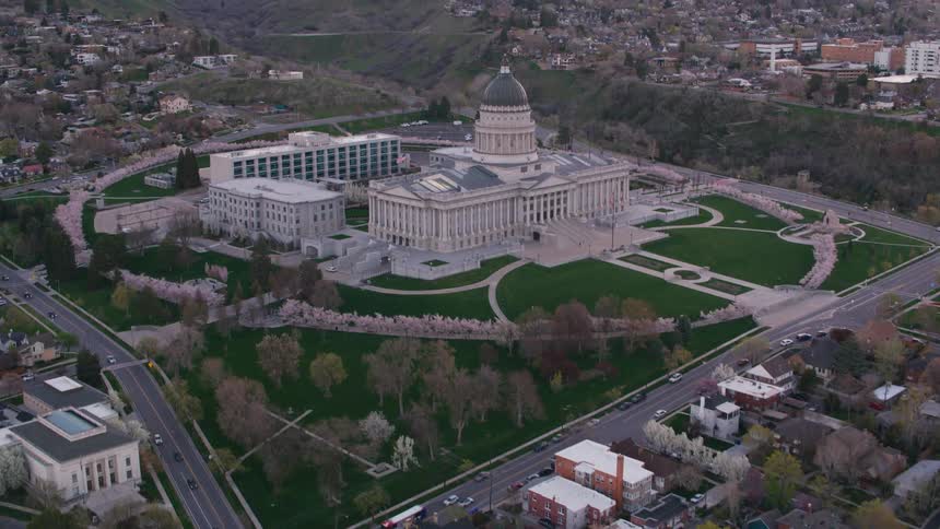A large government building in a city during the day
