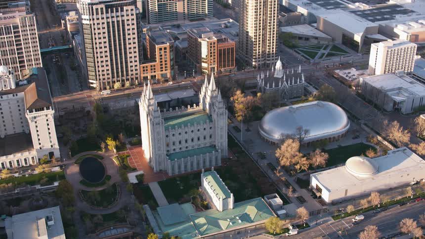 Aerial view of tall buildings in a downtown city is displayed