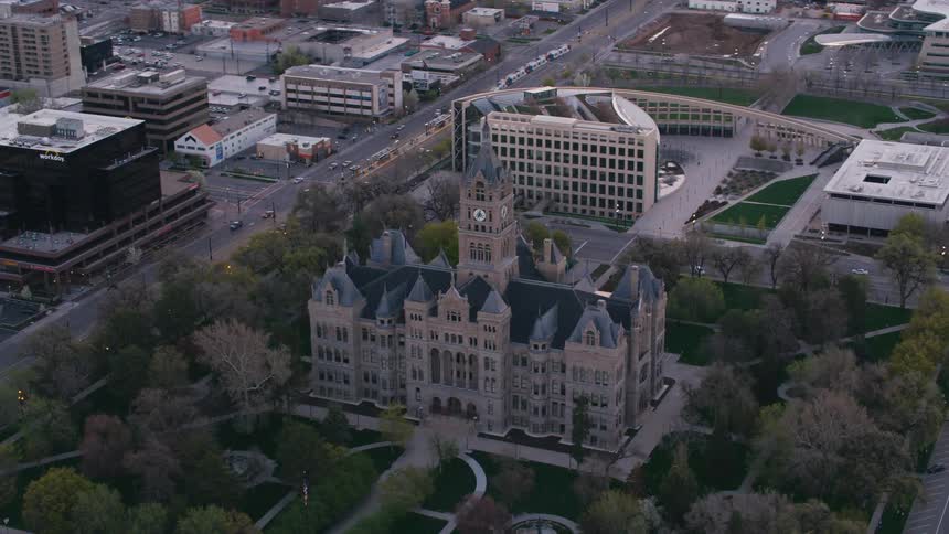 The paths and lush grounds of the salt lake city and county building in the heart of the city