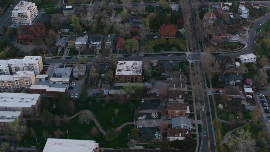 Cars traveling on a city and neighborhood grid of streets