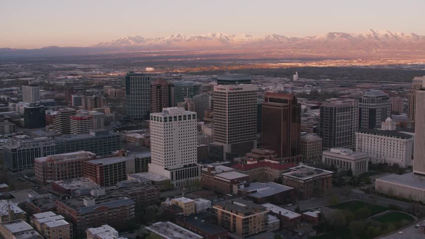 The sun is rising on the city