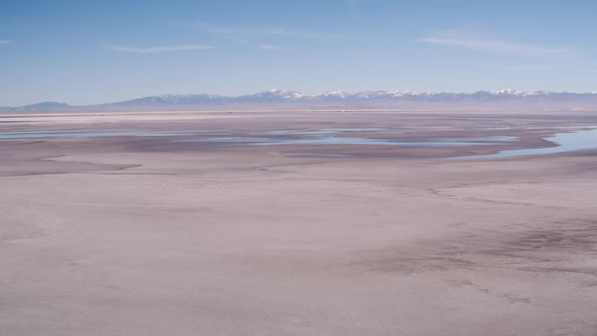 The long fields have pools of water