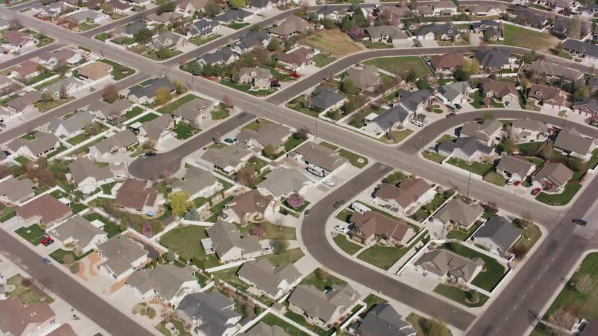 Aerial view of a neighborhood near the fields at daytime