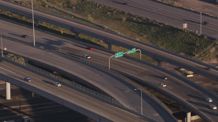 Vehicles travel on the winding highway