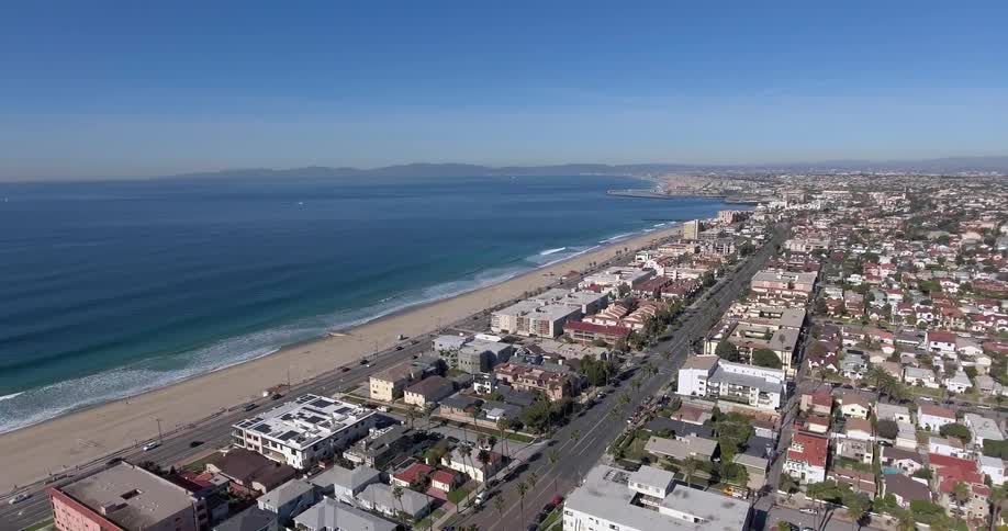 Aerial view of a coastal town on a sunny day