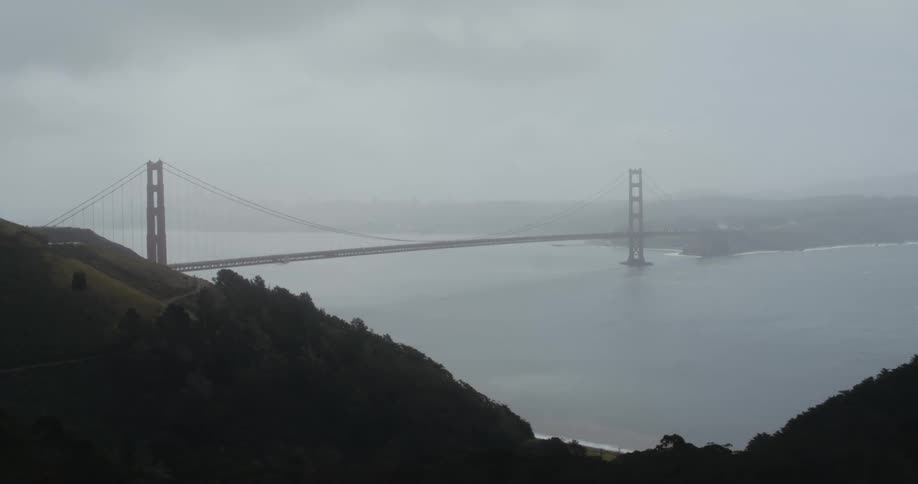Heavy fog covers the bridge