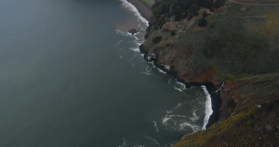 The waves are crashing against the shore