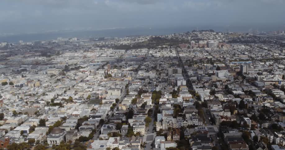 Aerial view of houses on a neighborhood next to the ocean