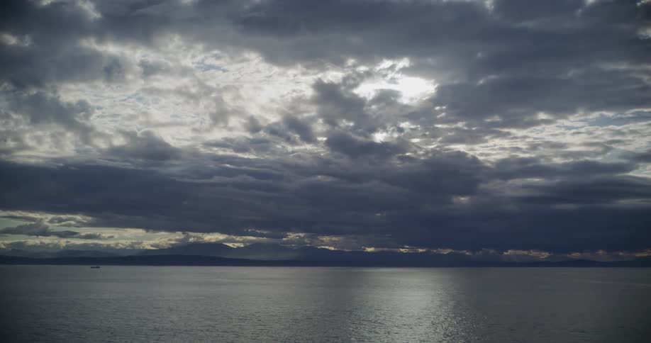View of body of water with cloudy sky