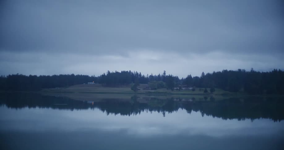 A view of a lake with an island in the middle