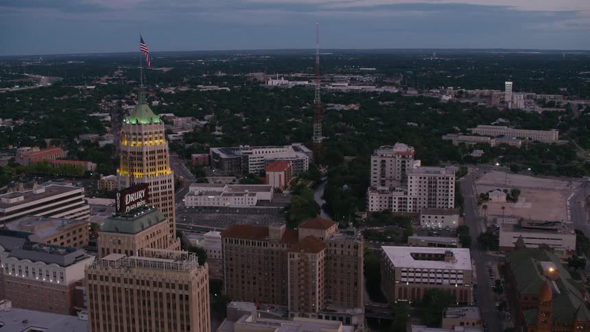 An aerial view of high rise office buildings in a city