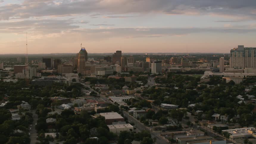 The sun is rising on the city