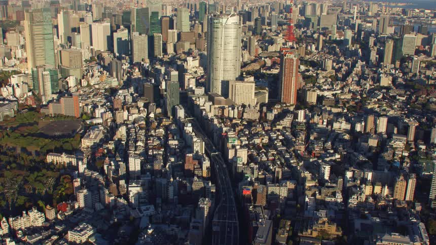Aerial view of highway apartment buildings and skyscrapers in the big city