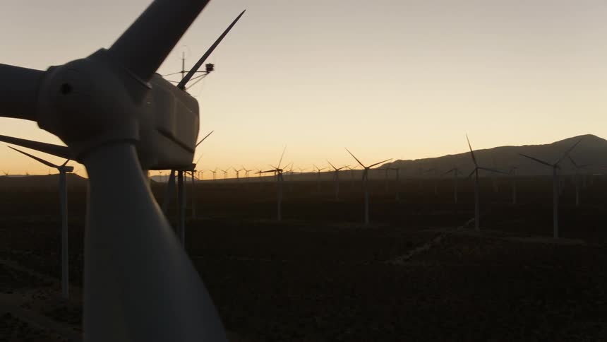Wind turbines in a field on a wind farm