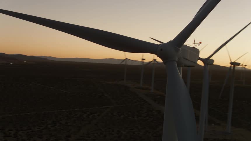 Wind turbines in a field on a wind farm