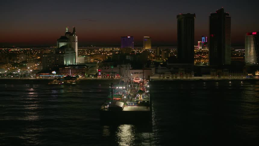 The port has many lights near the city