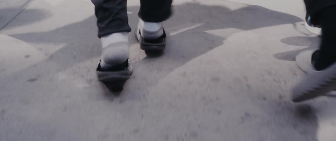 Close up view of peoples shoes as they are walking