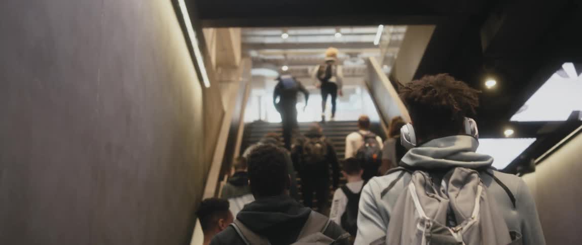 People travel up the stairwell