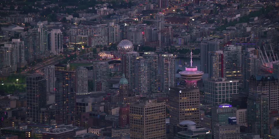 Aerial view of a downtown city is displayed at dusk
