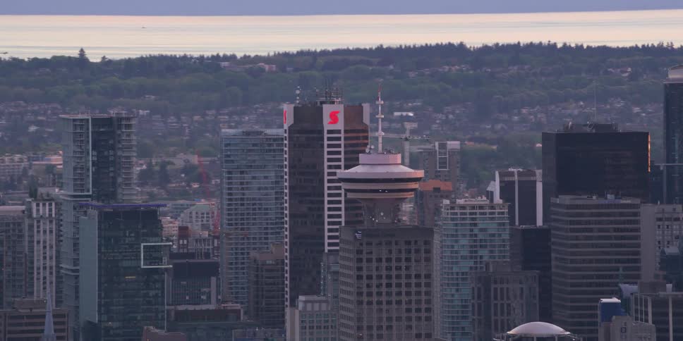 Aerial view of the skyscrapers on the city downtown skyline at evening
