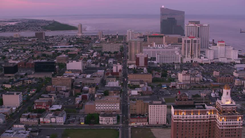 Aerial view of a downtown city is displayed at dusk