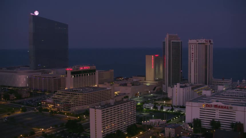 A view of a downtown city at night is displayed