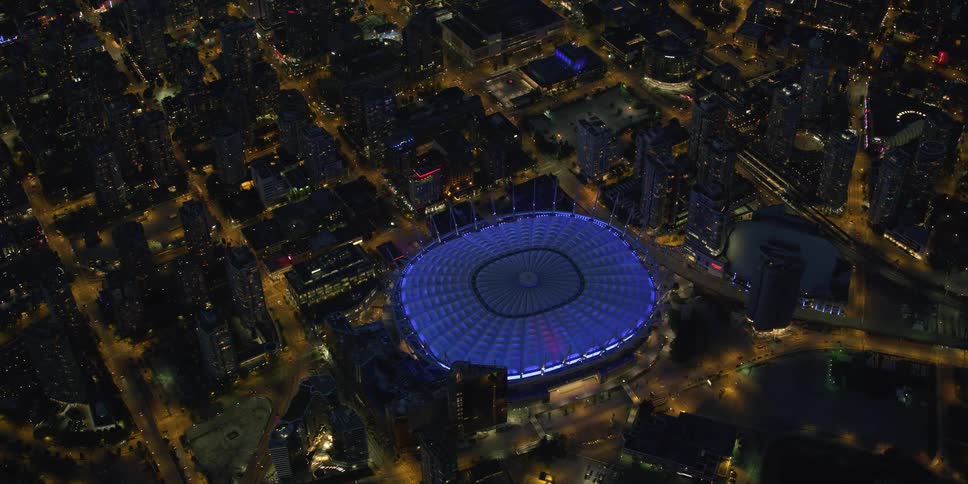 The stadium is lit at night