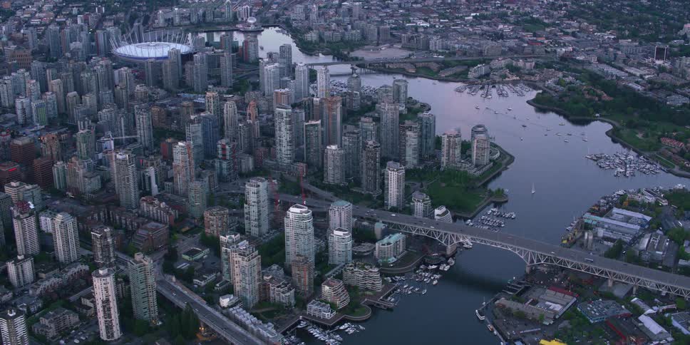 Aerial view of a highly populated city during dusk