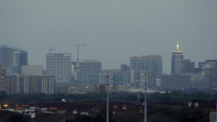 Panning a city on a cloudy day