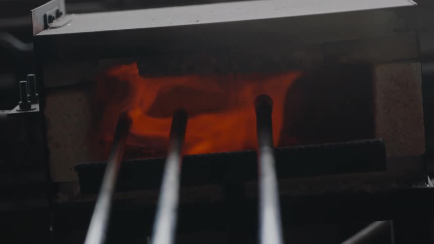 A view of flames in a glass blowing shop