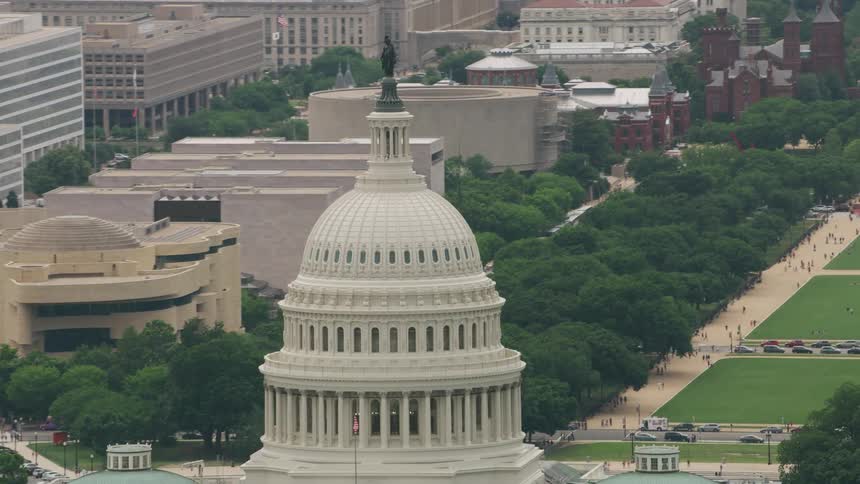 Aerial view of the dome of the united states capitol building with statue of freedom