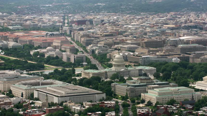 A government building in a metropolis during the day