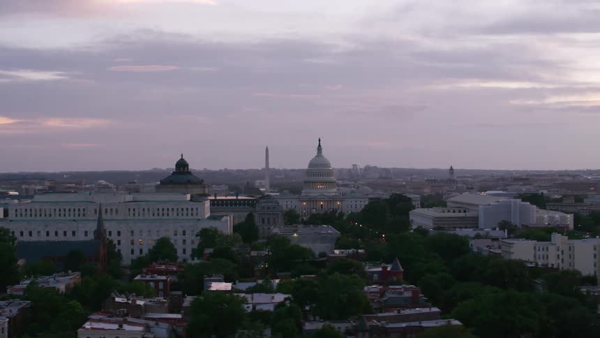 Aerial view of the dome of the united states capitol building at dusk