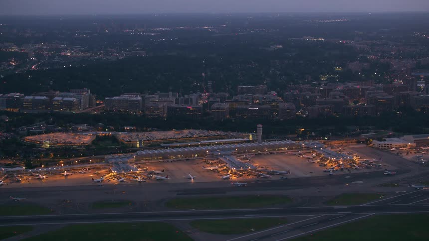 An aerial view of an airport at night