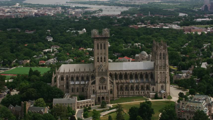 A large cathedral in a city during the day