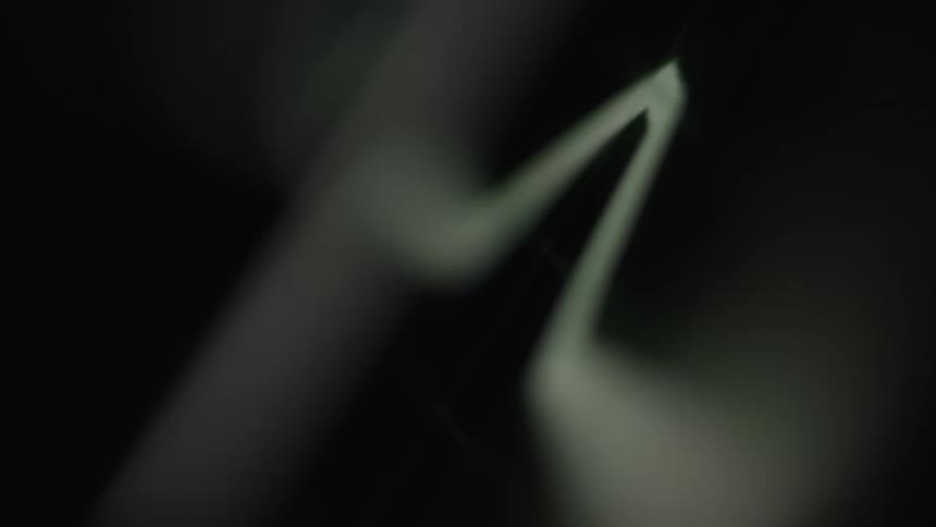 The line and beat of a heart rate monitor fading to black