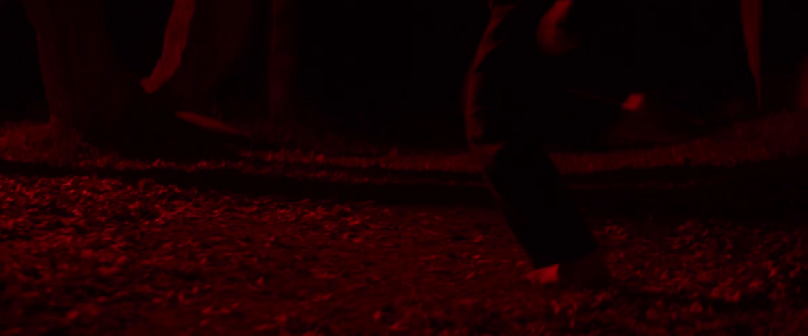 A woman dancing outdoors