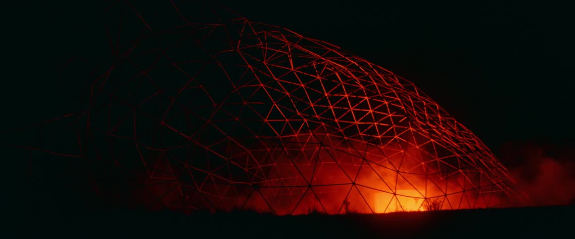 Smoke rises by the dome