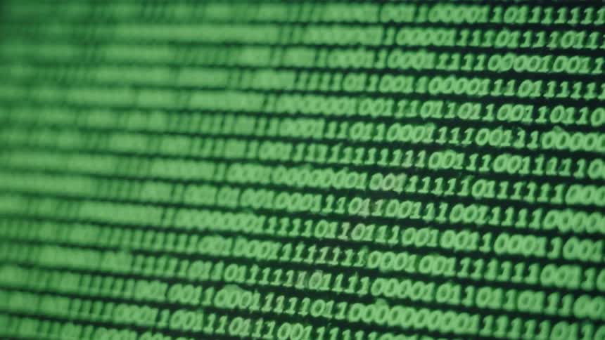 Ones and zeros flash across the screen as if it is stuck in the matrix
