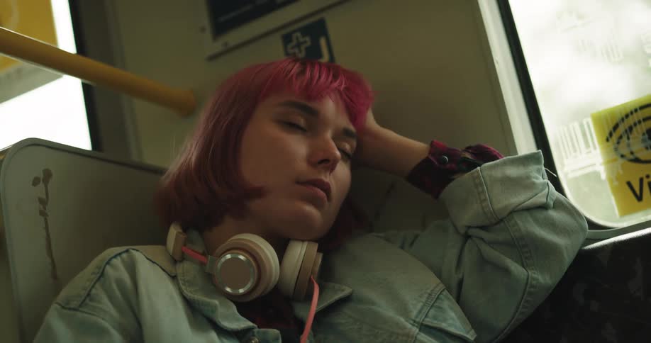 A woman rides the train