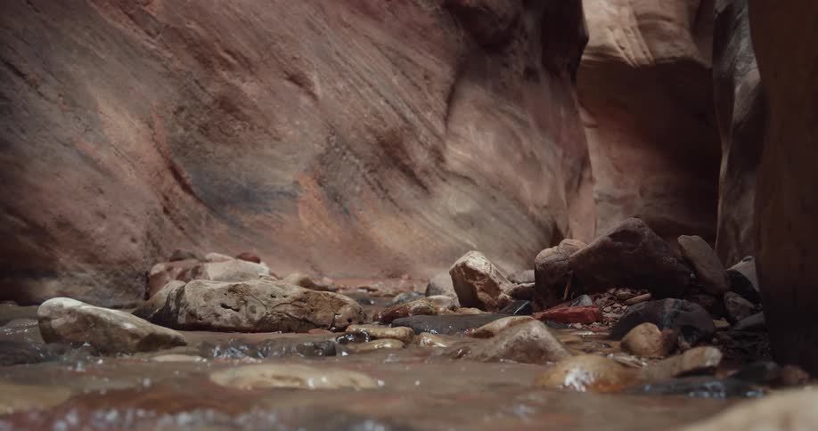 A river at the base of a cliff